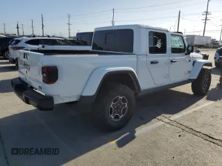 2021 Jeep Gladiator Mojave z VIN 1C6JJTEG6ML516867, wystawiony jako Copart lot #61167125 z przebiegiem 66 709 mil mil oraz Szkoda całkowita • Salvage title. Historia ofert i sprzedaży dostępna na DreamBid. Obrazek 3.