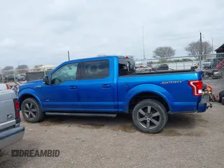 2015 Ford F-150 XL with VIN 1FTEW1CG1FKD20413, listed as a IAAI auction lot 41694489 with 147,431 mi miles and . Bid and sale history available at DreamBid. Image 14.
