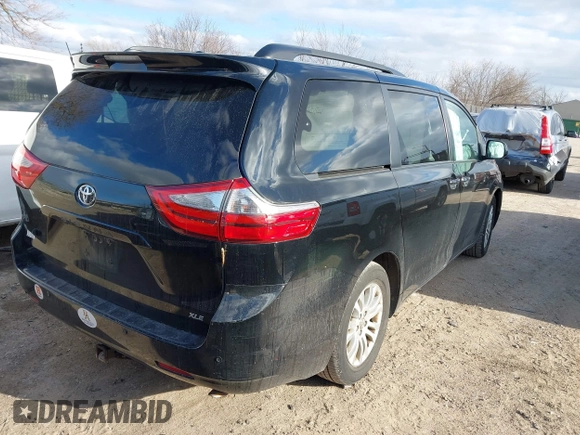 2015 Toyota Sienna XLE with VIN 5TDYK3DC2FS651400, listed as a IAAI auction lot 41985468 with 122,335 mi miles and . Bid and sale history available at DreamBid. Image 4.