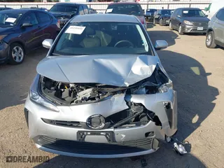 2022 Toyota Prius L Eco with VIN JTDKAMFU5N3189130, listed as a IAAI auction lot 41155935 with 44,253 mi miles. Bid and sale history available at carsss.com. Image 13.