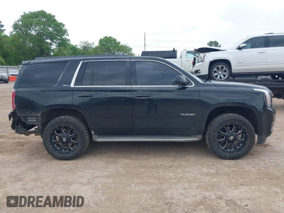 2015 GMC Yukon SLT with VIN 1GKS1BKC5FR274408, listed as a IAAI auction lot 41942157 with 165,978 mi miles. Bid and sale history available at carsss.com. Image 13.