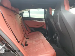 2021 BMW X4 M z VIN 5YMUJ0C08M9G61703, wystawiony jako Copart lot #78197533 z przebiegiem Nie podano mil oraz . Historia ofert i sprzedaży dostępna na DreamBid. Obrazek 11.