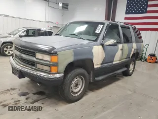1998 Chevrolet Tahoe z VIN 1GNEK13R7WJ308146, wystawiony jako Copart lot #87843305 z przebiegiem 180 920 mil mil oraz Czysty tytuł • Clean title. Historia ofert i sprzedaży dostępna na DreamBid. Obrazek 1.
