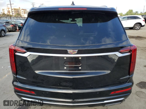 2023 Cadillac XT6 FWD Premium Luxury with VIN 1GYKPCRS9PZ117215, listed as a Copart auction lot 71242714 with 29,162 mi miles and Salvage Title. Bid and sale history available at carsss.com. Image 6.