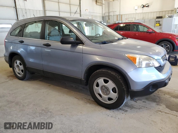 2007 Honda CR-V LX z VIN JHLRE383X7C040333, wystawiony jako Copart lot #57895475 z przebiegiem 124 156 mil mil oraz Szkoda całkowita • Salvage title. Historia ofert i sprzedaży dostępna na DreamBid. Obrazek 4.