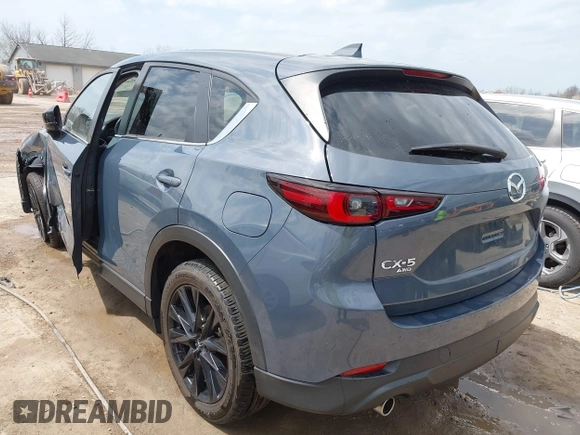 2022 Mazda CX-5 S Preferred with VIN JM3KFBCM2N0528204, listed as a IAAI auction lot 42054842 with 32,066 mi miles and . Bid and sale history available at carsss.com. Image 3.