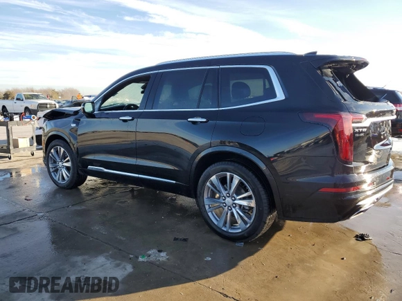 2023 Cadillac XT6 FWD Premium Luxury z VIN 1GYKPCRS6PZ127331, wystawiony jako Copart lot #88802755 z przebiegiem 47 796 mil mil oraz Szkoda całkowita • Salvage title. Historia ofert i sprzedaży dostępna na DreamBid. Obrazek 2.