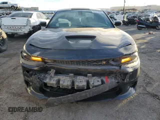 2020 Dodge Charger Scat Pack Widebody z VIN 2C3CDXGJ7LH231846, wystawiony jako Copart lot #87971485 z przebiegiem 60 856 mil mil oraz Szkoda całkowita • Salvage title. Historia ofert i sprzedaży dostępna na DreamBid. Obrazek 5.