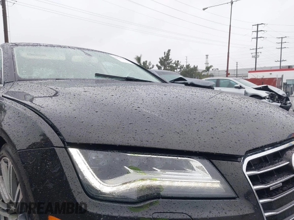 2014 Audi A7 3.0 Prestige with VIN WAU2GAFC5EN090233, listed as a IAAI auction lot 41565942 with 199,890 mi miles. Bid and sale history available at carsss.com. Image 20.