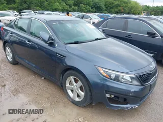 2015 Kia Optima LX with VIN KNAGM4A75F5599542, listed as a IAAI auction lot 42467111 with 119,083 mi miles and . Bid and sale history available at DreamBid. Image 1.
