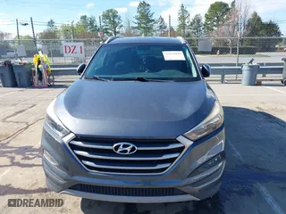 2017 Hyundai Tucson Value with VIN KM8J33A25HU402366, listed as a IAAI auction lot 41814426 with 117,669 mi miles. Bid and sale history available at carsss.com. Image 6.