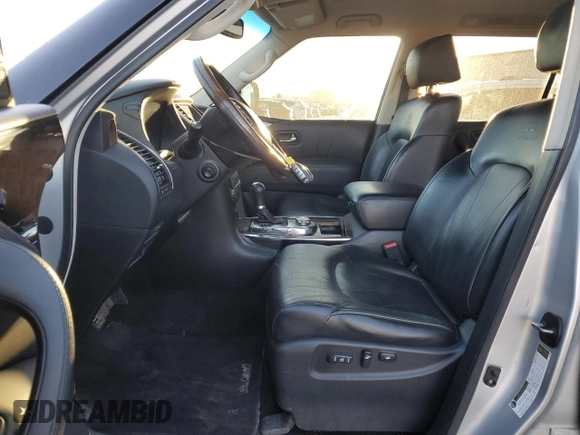 2012 Infiniti QX56 7-passenger with VIN JN8AZ2NE3C9020984, listed as a Copart auction lot 79496474 with 335,406 mi miles and Clean Title. Bid and sale history available at carsss.com. Image 7.