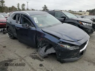 2022 Mazda CX-30 2.5 Turbo with VIN 3MVDMBAY5NM447836, listed as a Copart auction lot 87030384 with 38,008 mi miles and Salvage Title. Bid and sale history available at DreamBid. Image 4.