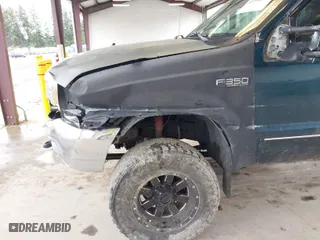 1999 Ford Super Duty F-350 SRW XL with VIN 1FTSX31F3XEA41504, listed as a IAAI auction lot 41916567 with 291,742 mi miles. Bid and sale history available at carsss.com. Image 6.