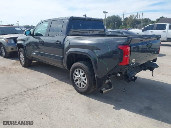 2024 Toyota Tacoma 4WD SR5 with VIN 3TMLB5JN5RM052698, listed as a IAAI auction lot 41427313 with 9,624 mi miles. Bid and sale history available at carsss.com. Image 3.