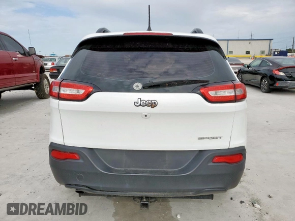 2015 Jeep Cherokee Sport with VIN 1C4PJLAB9FW632112, listed as a Copart auction lot 63265295 with 83,301 mi miles and Salvage title. Bid and sale history available at DreamBid. Image 6.