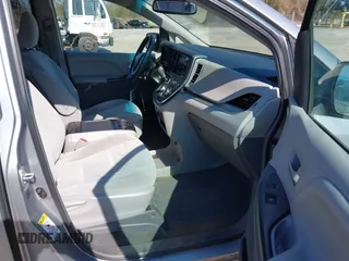 2015 Toyota Sienna LE AAS with VIN 5TDKK3DC4FS557542, listed as a IAAI auction lot 41756997 with 256,000 mi miles. Bid and sale history available at carsss.com. Image 5.