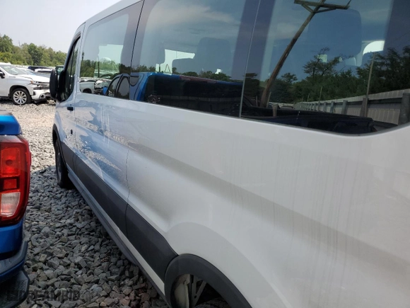 2023 Ford Transit Passenger Wagon XL with VIN 1FBAX2Y85PKB44264, listed as a Copart auction lot 52233154 with 2,537 mi miles and Salvage Title. Bid and sale history available at carsss.com. Image 2.
