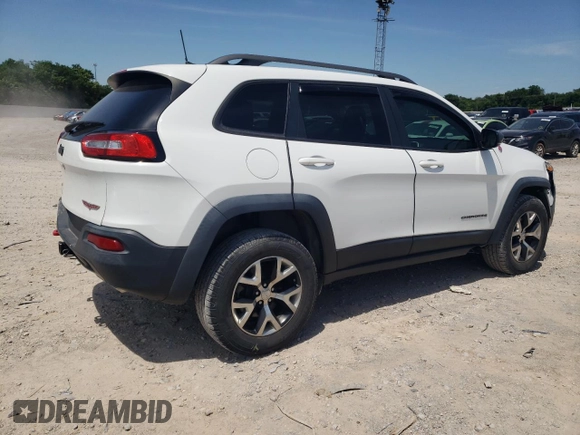 2016 Jeep Cherokee Trailhawk with VIN 1C4PJMBS3GW102000, listed as a Copart auction lot 60866505 with 120,985 mi miles and Salvage title. Bid and sale history available at DreamBid. Image 3.