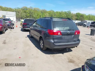 2010 Toyota Sienna CE with VIN 5TDKK4CC5AS296647, listed as a IAAI auction lot 42108661 with 204,048 mi miles and . Bid and sale history available at DreamBid. Image 3.