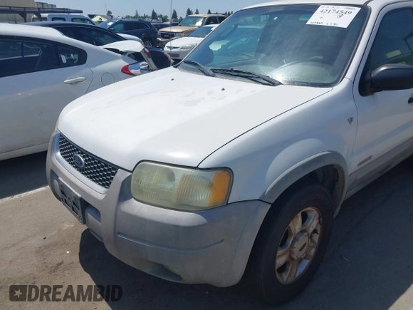 2001 Ford Escape XLT with VIN 1FMYU04131KB70753, listed as a IAAI auction lot 42174549 with 209,485 mi miles and . Bid and sale history available at DreamBid. Image 6.