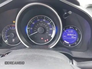 2020 Honda Fit LX z VIN 3HGGK5H40LM717305, wystawiony jako IAAI lot #42093169 z przebiegiem 69 665 mil mil oraz . Historia ofert i sprzedaży dostępna na DreamBid. Obrazek 7.