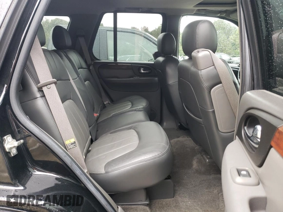 2004 GMC Envoy SLT with VIN 1GKDT13S942279670, listed as a Copart auction lot 73527974 with 120,425 mi miles and Salvage Title. Bid and sale history available at DreamBid. Image 11.