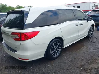 2018 Honda Odyssey Elite z VIN 5FNRL6H94JB008108, wystawiony jako IAAI lot #42126779 z przebiegiem 93 859 mil mil oraz . Historia ofert i sprzedaży dostępna na DreamBid. Obrazek 4.