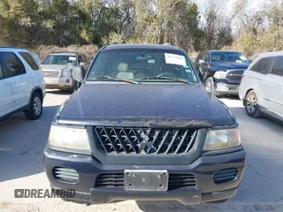 2002 Mitsubishi Montero Sport ES with VIN JA4LS21H02J040318, listed as a IAAI auction lot 41272566 with 278,339 mi miles. Bid and sale history available at carsss.com. Image 6.