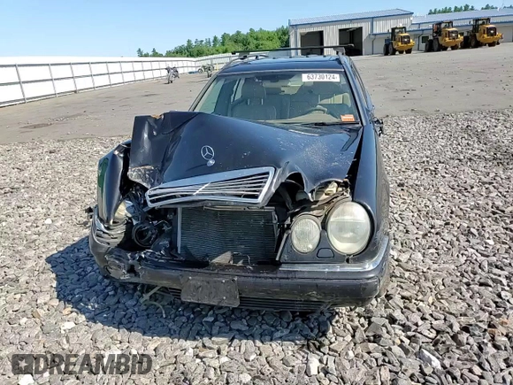 1999 Mercedes-Benz E-Class with VIN WDBJH82F8XX020574, listed as a Copart auction lot 63730124 with 201,401 mi miles and Salvage Title. Bid and sale history available at carsss.com. Image 10.