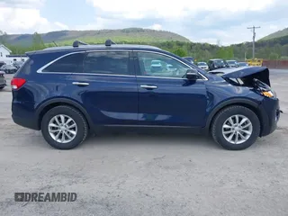 2017 Kia Sorento LX z VIN 5XYPG4A50HG290791, wystawiony jako IAAI lot #42148814 z przebiegiem 125 480 mil mil oraz . Historia ofert i sprzedaży dostępna na DreamBid. Obrazek 13.