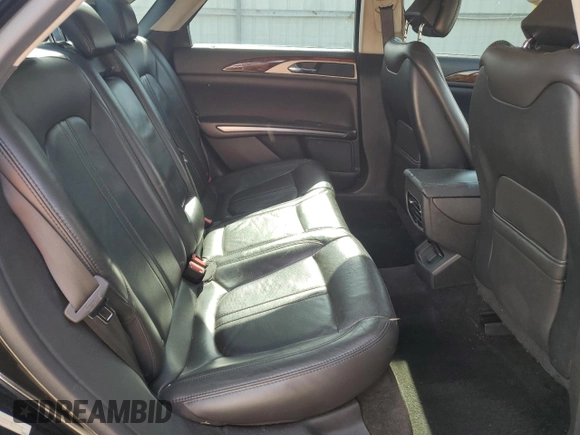 2013 Lincoln MKZ z VIN 3LN6L2GK5DR823755, wystawiony jako Copart lot #53060295 z przebiegiem 145 624 mil mil oraz Szkoda całkowita • Salvage title. Historia ofert i sprzedaży dostępna na DreamBid. Obrazek 10.