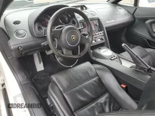 2012 Lamborghini Gallardo z VIN ZHWGU6BZ7CLA11933, wystawiony jako Copart lot #78625754 z przebiegiem Nie podano mil oraz Szkody całkowita. Historia ofert i sprzedaży dostępna na DreamBid. Obrazek 8.