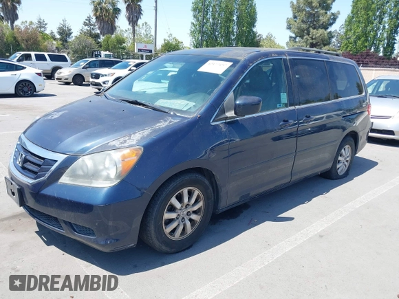 2009 Honda Odyssey EX-L with VIN 5FNRL386X9B409419, listed as a IAAI auction lot 42177197 with 190,827 mi miles. Bid and sale history available at carsss.com. Image 2.