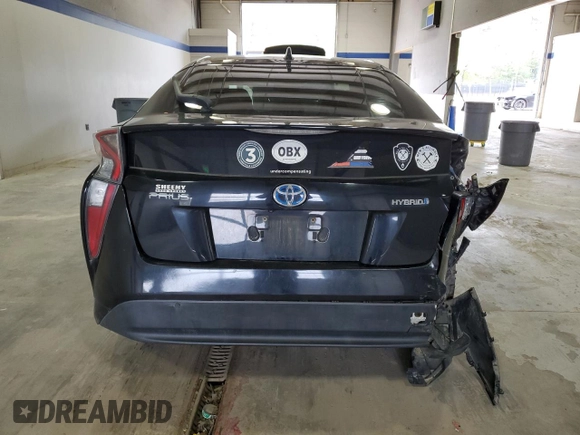 2016 Toyota Prius Two z VIN JTDKBRFU5G3004734, wystawiony jako Copart lot #52935165 z przebiegiem 197 204 mil mil oraz Szkoda całkowita • Salvage title. Historia ofert i sprzedaży dostępna na DreamBid. Obrazek 6.
