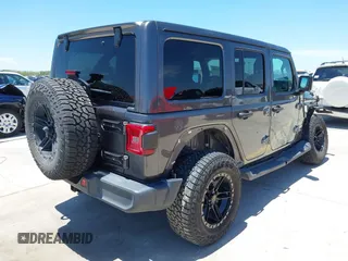 2018 Jeep Wrangler Unlimited Sahara with VIN 1C4HJXEN1JW236779, listed as a IAAI auction lot 42238158 with 72,879 mi miles and . Bid and sale history available at DreamBid. Image 4.