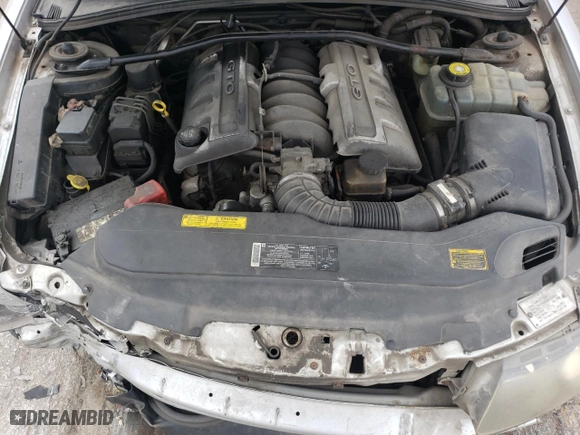2004 Pontiac GTO with VIN 6G2VX12G84L280263, listed as a Copart auction lot 66575924 with 112,302 mi miles and Salvage Title. Bid and sale history available at carsss.com. Image 11.