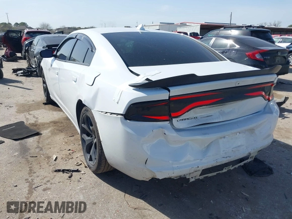 2015 Dodge Charger SXT with VIN 2C3CDXHG8FH725446, listed as a IAAI auction lot 41742400 with 84,579 mi miles and . Bid and sale history available at DreamBid. Image 3.