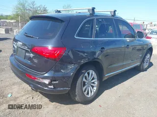 2014 Audi Q5 Premium Plus z VIN WA1LFBFP4EA006181, wystawiony jako IAAI lot #42140321 z przebiegiem 104 870 mil mil oraz . Historia ofert i sprzedaży dostępna na DreamBid. Obrazek 4.
