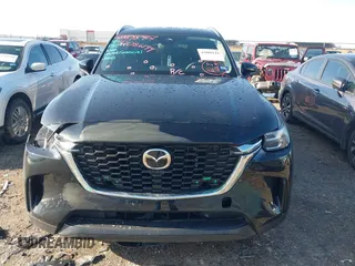 2024 Mazda CX-90 Select z VIN JM3KKAHD3R1165975, wystawiony jako IAAI lot #42086144 z przebiegiem 10 317 mil mil oraz . Historia ofert i sprzedaży dostępna na DreamBid. Obrazek 13.