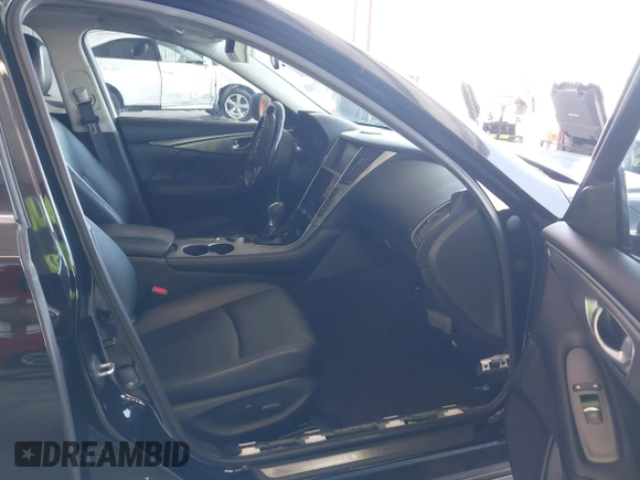 2015 Infiniti Q50 z VIN JN1BV7AR9FM400238, wystawiony jako IAAI lot #42497174 z przebiegiem 69 935 mil mil oraz . Historia ofert i sprzedaży dostępna na DreamBid. Obrazek 5.