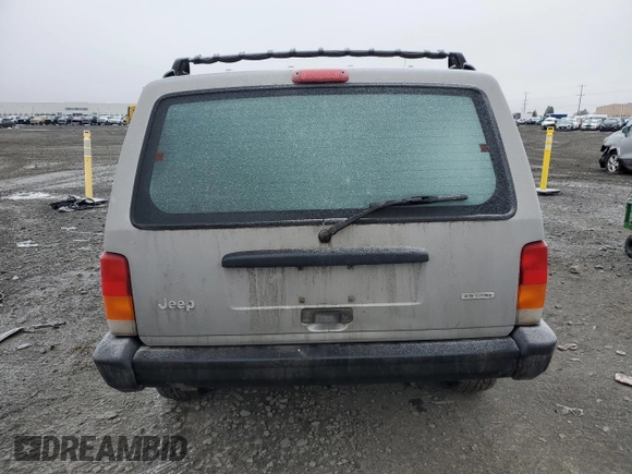 2000 Jeep Cherokee SE with VIN 1J4FF28S9YL222714, listed as a Copart auction lot 88575685 with 203,691 mi miles and Salvage Title. Bid and sale history available at carsss.com. Image 6.