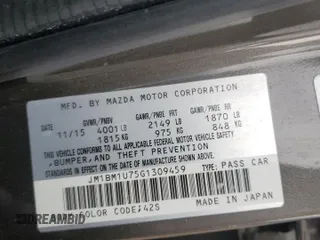 2016 Mazda 3 i Sport with VIN JM1BM1U75G1309459, listed as a Copart auction lot 52562795 with 147,418 mi miles and Salvage Title. Bid and sale history available at DreamBid. Image 13.