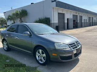 2009 Volkswagen Jetta SE z VIN 3VWRM71K89M145377, wystawiony jako Copart lot #66104525 z przebiegiem 161 429 mil mil oraz Czysty tytuł • Clean title. Historia ofert i sprzedaży dostępna na DreamBid. Obrazek 1.