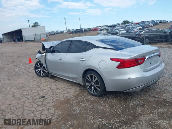 2016 Nissan Maxima SV with VIN 1N4AA6AP7GC439288, listed as a IAAI auction lot 41572262 with 223,185 mi miles and . Bid and sale history available at DreamBid. Image 3.