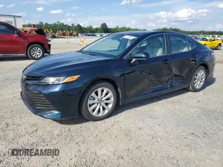2018 Toyota Camry LE with VIN 4T1B11HK0JU565596, listed as a Copart auction lot 60219235 with 9,809 mi miles and Salvage title. Bid and sale history available at DreamBid. Image 1.