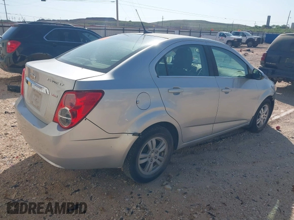 2013 Chevrolet Sonic LT with VIN 1G1JC5SB9D4195899, listed as a IAAI auction lot 42088459 with Not Provided miles and . Bid and sale history available at DreamBid. Image 4.