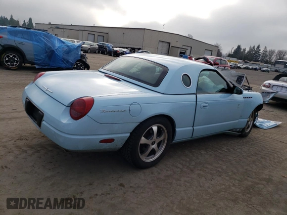 2003 Ford Thunderbird Deluxe z VIN 1FAHP60A03Y100881, wystawiony jako Copart lot #83381114 z przebiegiem Nie podano mil oraz Szkoda całkowita • Salvage title. Historia ofert i sprzedaży dostępna na DreamBid. Obrazek 3.