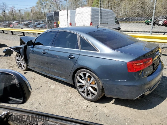 2014 Audi A6 Prestige z VIN WAUHGAFCXEN115962, wystawiony jako Copart lot #52228395 z przebiegiem 134 622 mil mil oraz Szkoda całkowita • Salvage title. Historia ofert i sprzedaży dostępna na DreamBid. Obrazek 2.