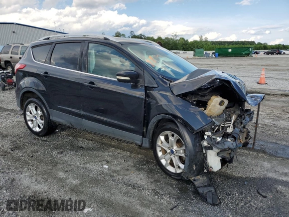 2015 Ford Escape Titanium with VIN 1FMCU0J96FUC59510, listed as a Copart auction lot 57091765 with 120,586 mi miles and Salvage title. Bid and sale history available at DreamBid. Image 4.
